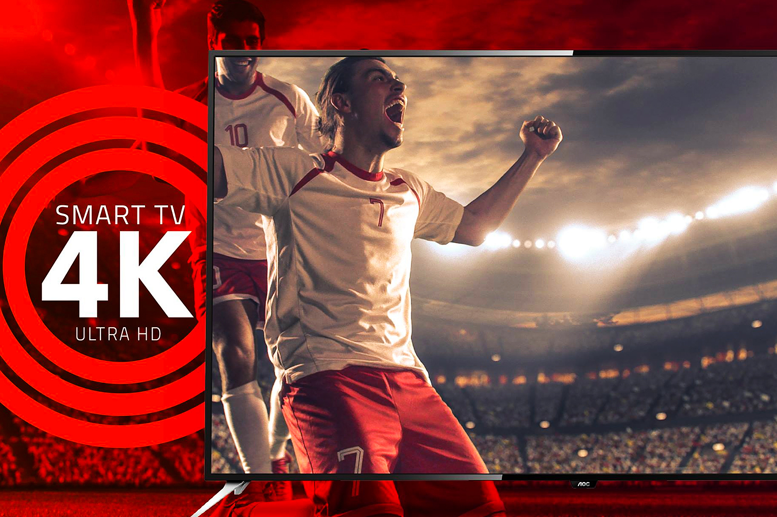 AOC advertisement of two pro-soccer players in stadium with excited facial expressions being shown on an AOC monitor.