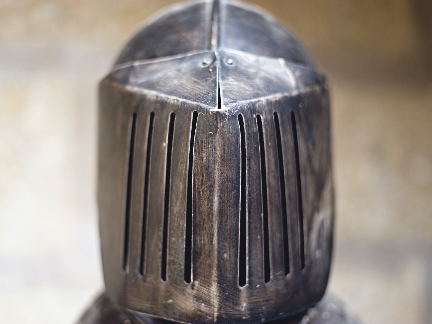 An image of a knight's helmet. Photo by Simon Maage on Unsplash