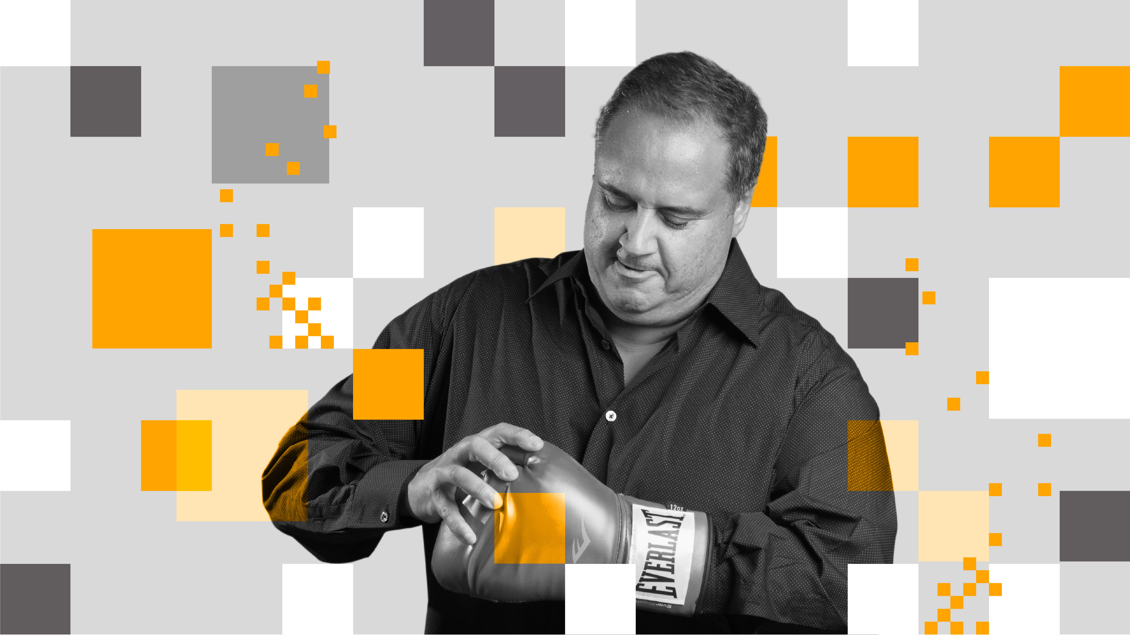 Man in a dark shirt putting on a boxing glove, with orange and gray geometric shapes in the background.